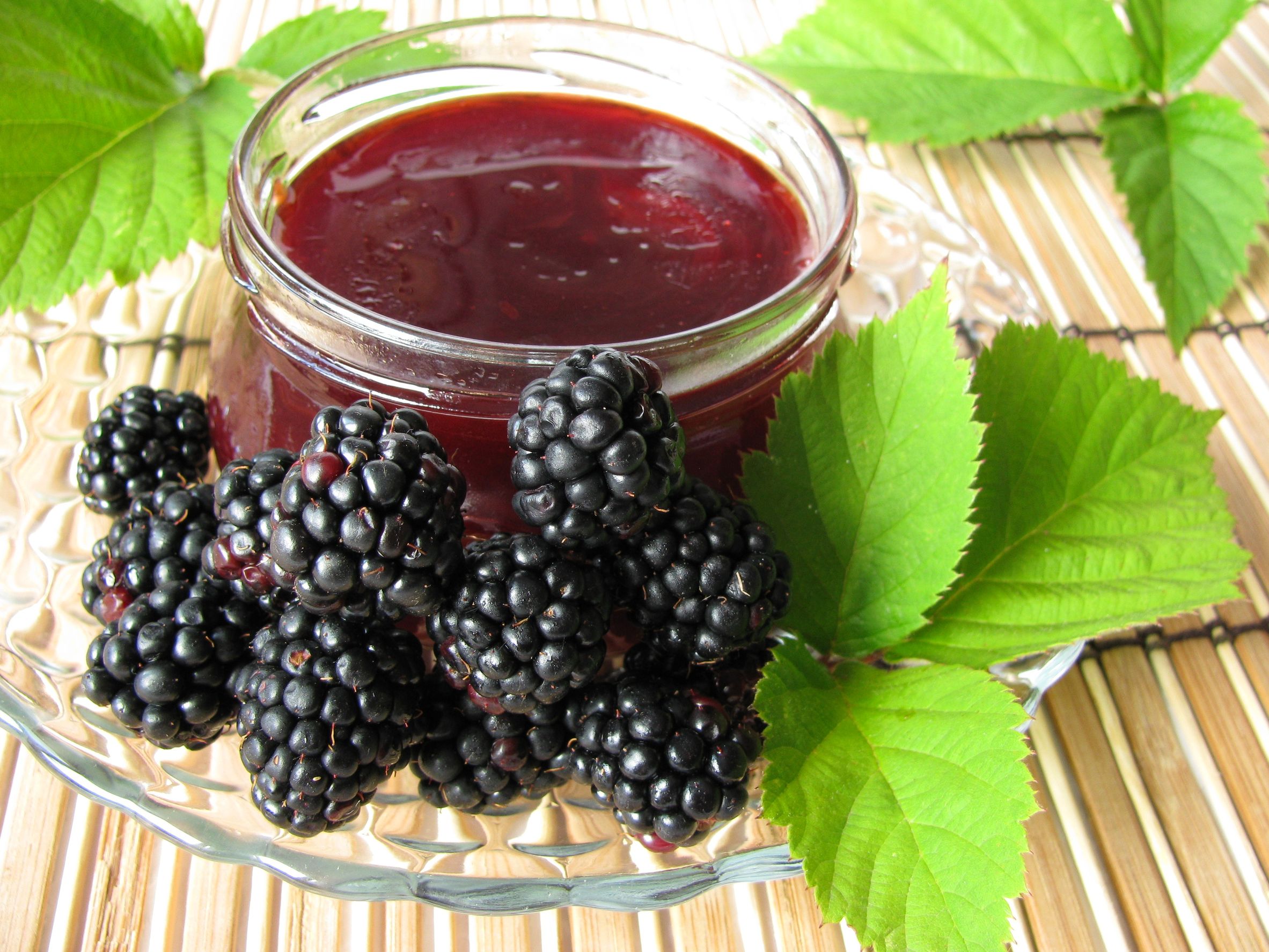 9978324 - homemade blackberry jelly and fresh blackberries
