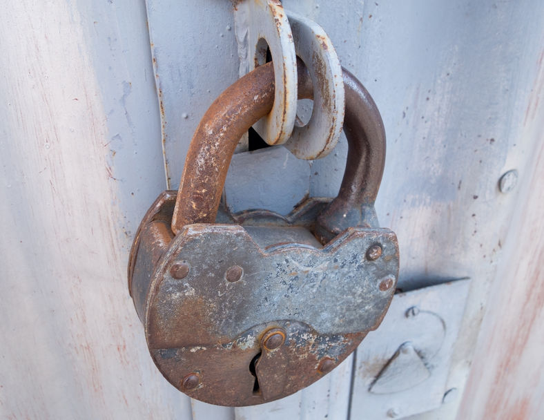 47478035 - background of door with lock in metal material