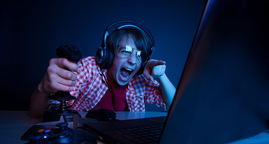 38169541 - he had revenge in video games. emotional kid play computer games online.