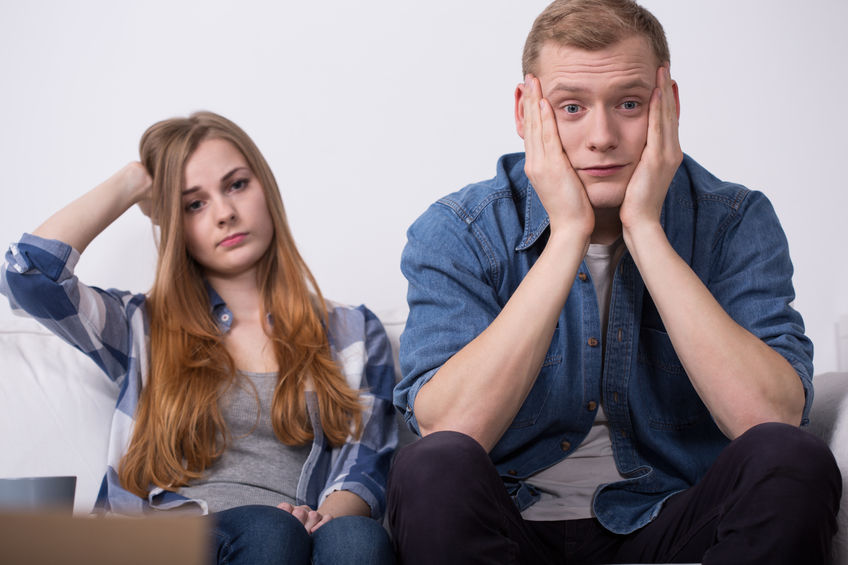 42689176 - troubled young couple during move out process