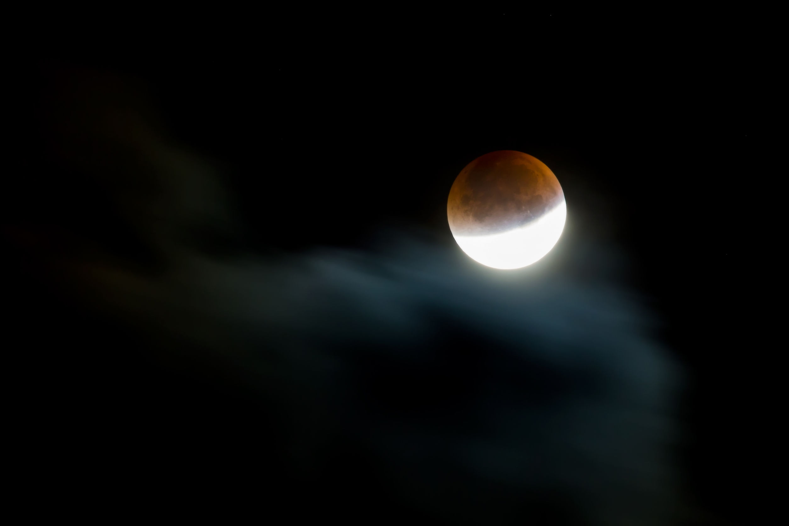 46293452 - supermoon and blood moon eclipse coincide on 28th september 2015.