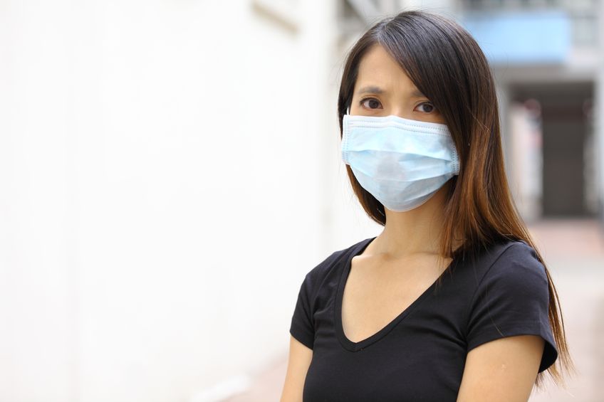 19412134 - asian woman wear protective face mask
