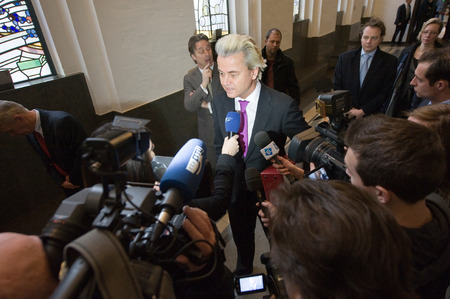 26971741 - enschede, netherlands - jan 25  political leader geert wilders of the dutch center right party pvv surrounded by press giving an interview, january 25, 2013 in the netherlands