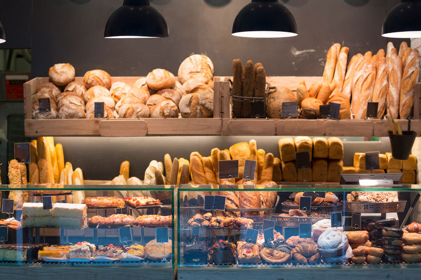 44755642 - modern bakery with assortment of bread, cakes and buns