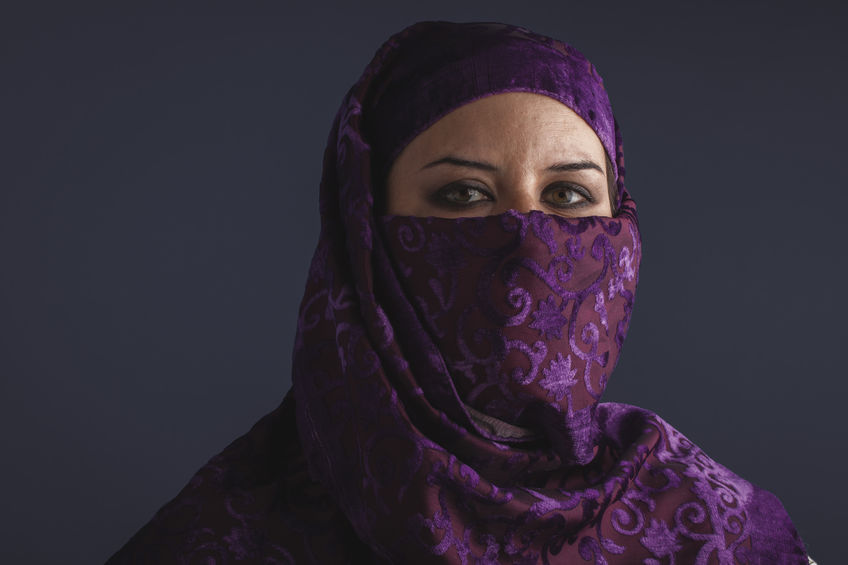 50072343 - burka beautiful arabic woman with traditional burqa veil