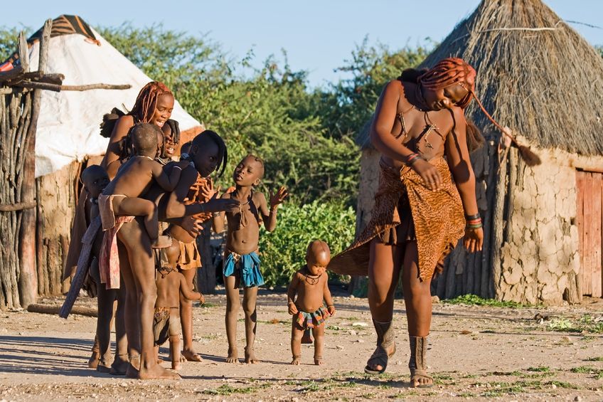 15181481 - himba people perform traditional dance in namibian village