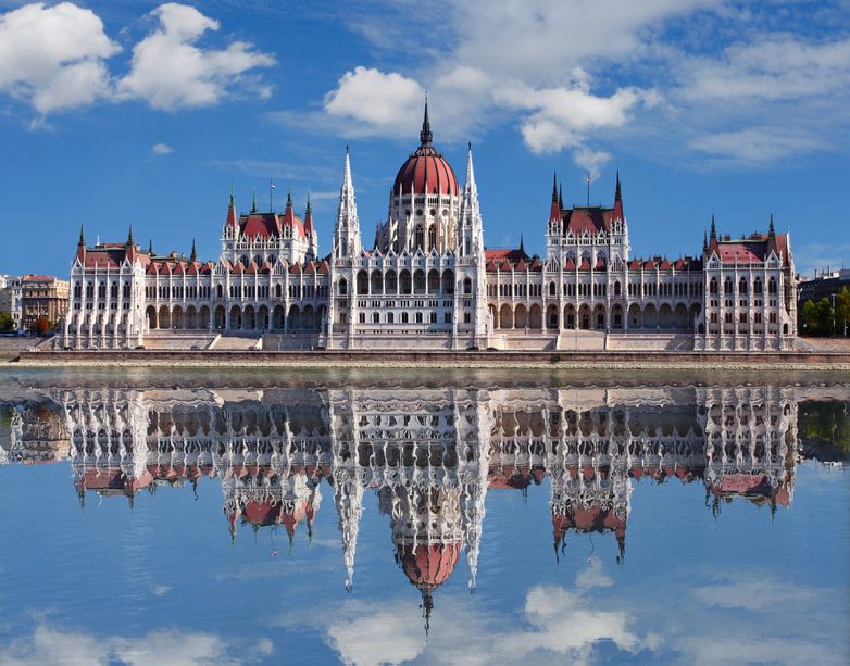 16217992 - budapest - hungarian parliament with reflection in danube river