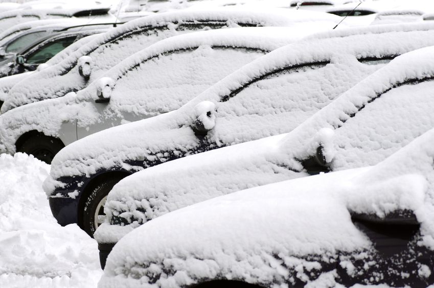 18424768 - cars covered in snow during snowstorm