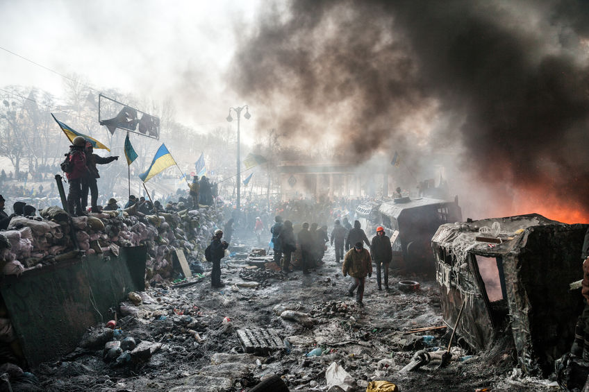 25386976 - kiev, ukraine - january 25, 2014: mass anti-government protests in the center of kiev. barricades in the conflict zone on hrushevskoho st.