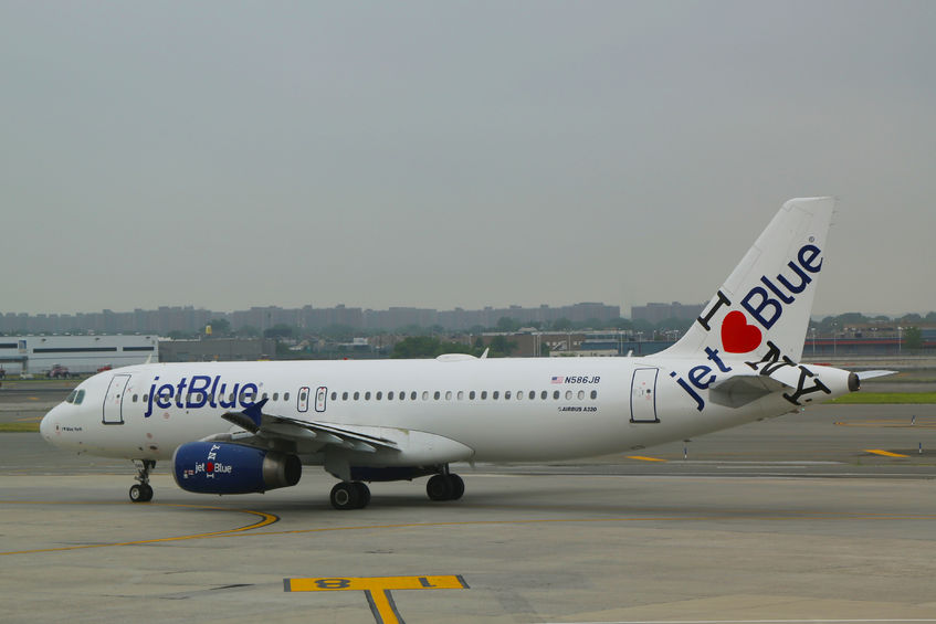 30093593 - new york- june 10 jetblue airbus a320 with ny s hometown airline tailfin design taxing at john f kennedy international airport in new york on june 10, 2014