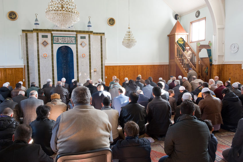 36547384 - enschede, the netherlands - feb 13, 2015: muslims have gathered for the friday afternoon prayer in a mosque and are listening to the speech of an imam