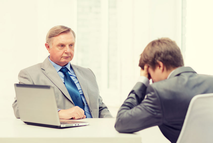 40249582 - business, technology and office concept - older man and young man having argument in office
