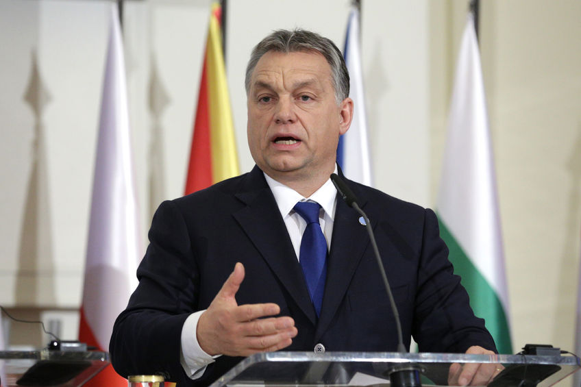 53572629 - prague, czech republic - february 15, 2016: the prime ministers of hungary viktor orban is speaking during a press conference after meeting of the visegrad group (v4) in prague, czech republic.