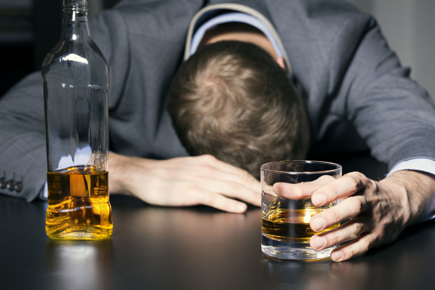 52135138 - alcohol addiction - drunk businessman holding a glass of whiskey