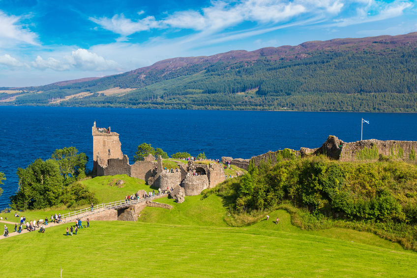 70733684 - urquhart castle along loch ness lake in scotland in a beautiful summer day, united kingdom