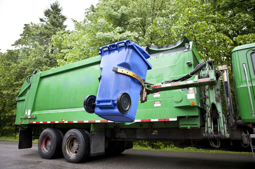 10595058 - recycling truck picking up bin - horizontal version
