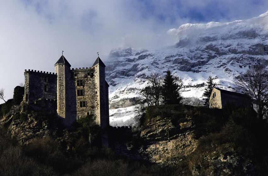 11424364 - miolans castle, where the marquis de sade was imprisoned, and snow on mountains