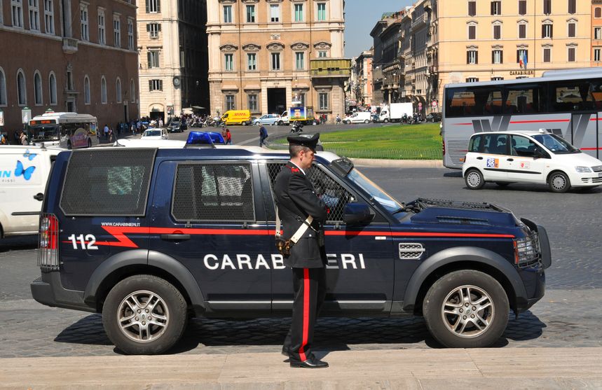 14136651 - rome, italy - 29 march, 2012: carabinieri, the national military police of italy, guarding in piazza venezia