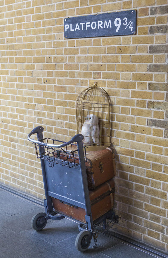 42840681 - london, uk - july 10th 2015: platform 9 3/4 at kings cross train station made famous in the harry potter movies, in london on 10th july 2015.