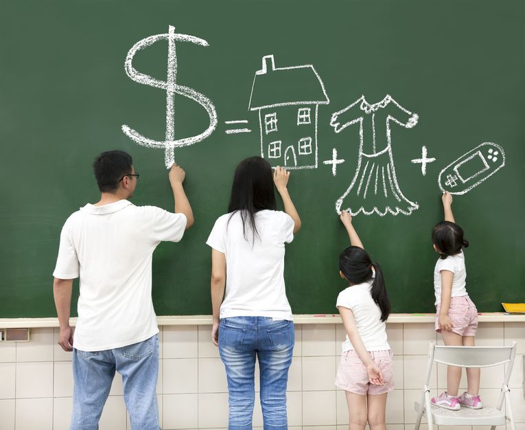 15905445 - family drawing money house clothes and video game symbol on the chalkboard