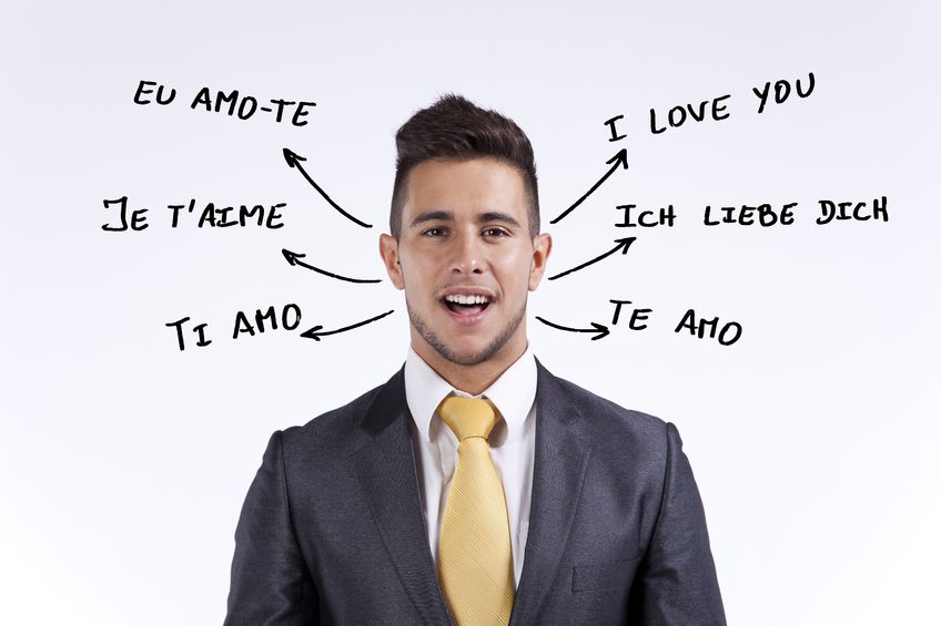 16388560 - happy businessman saying i love you in portuguese, french, english, italian, spanish and german