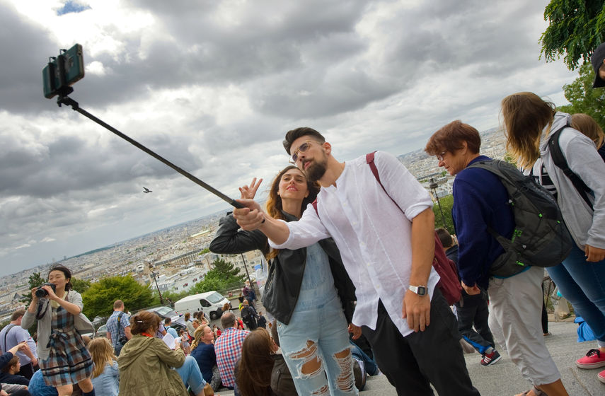 44268214 - paris, france - july 27, 2015: a couple is making a selfie in front of the sacre coeur in montmartre in paris in france