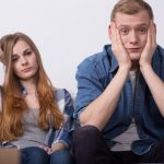 42689176 – troubled young couple during move out process