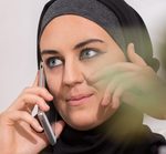 45534605 – panorama of modern arabic woman in hijab talking on mobilephone
